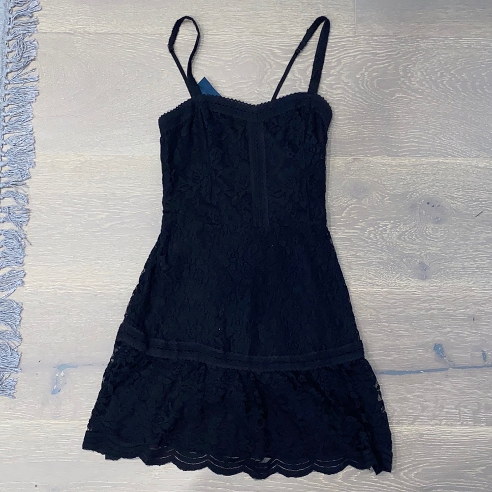 Unworn black floral/lace dress